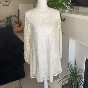 White lace long sleeve dress.